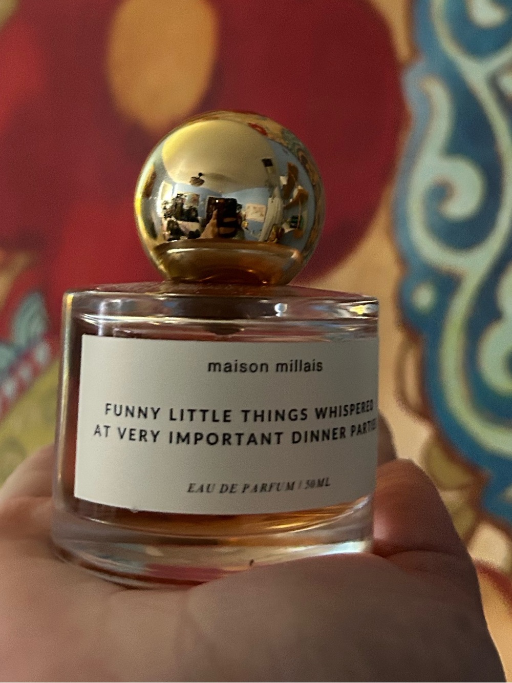 Anthropologie perfume bottle with gold cap and clear glass
